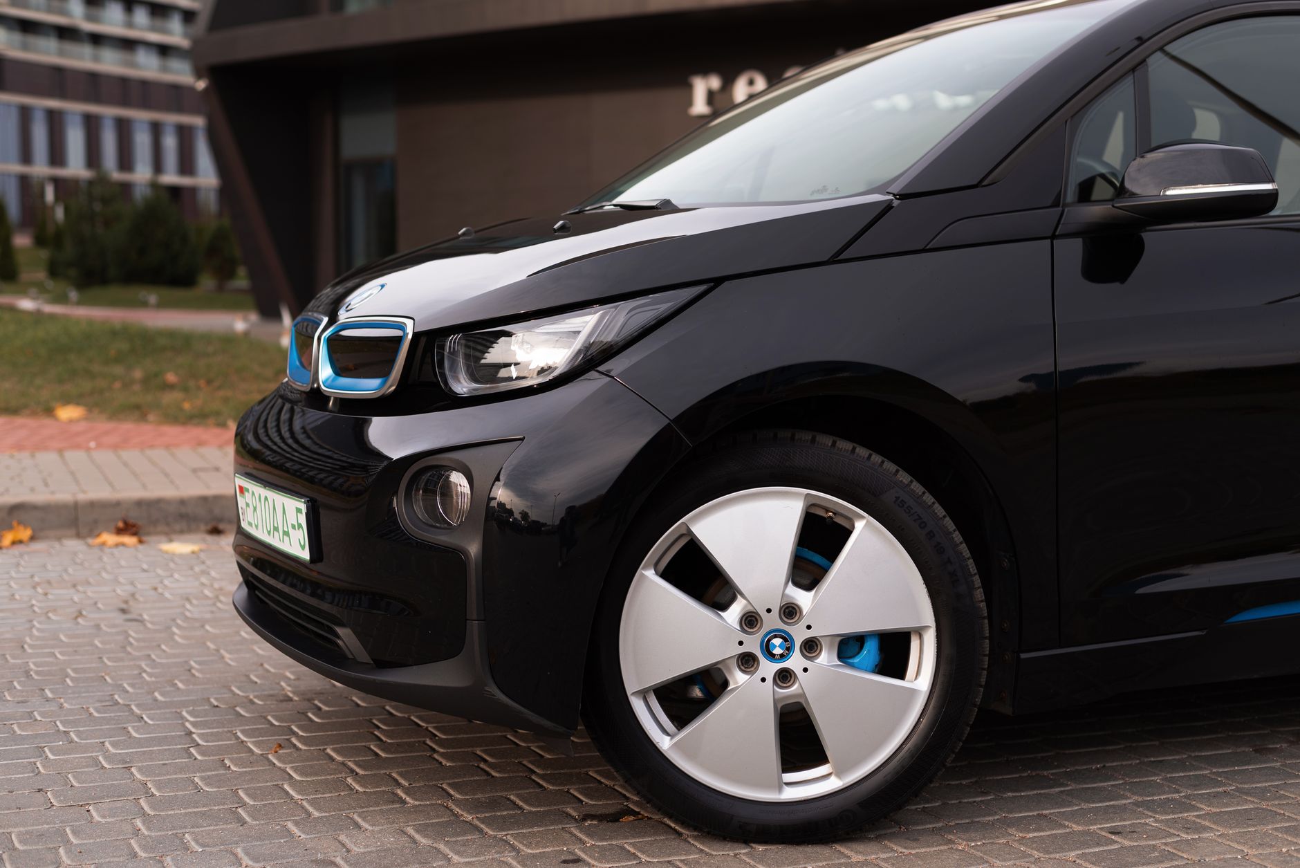 Electric car charging in a Scandinavian natural landscape