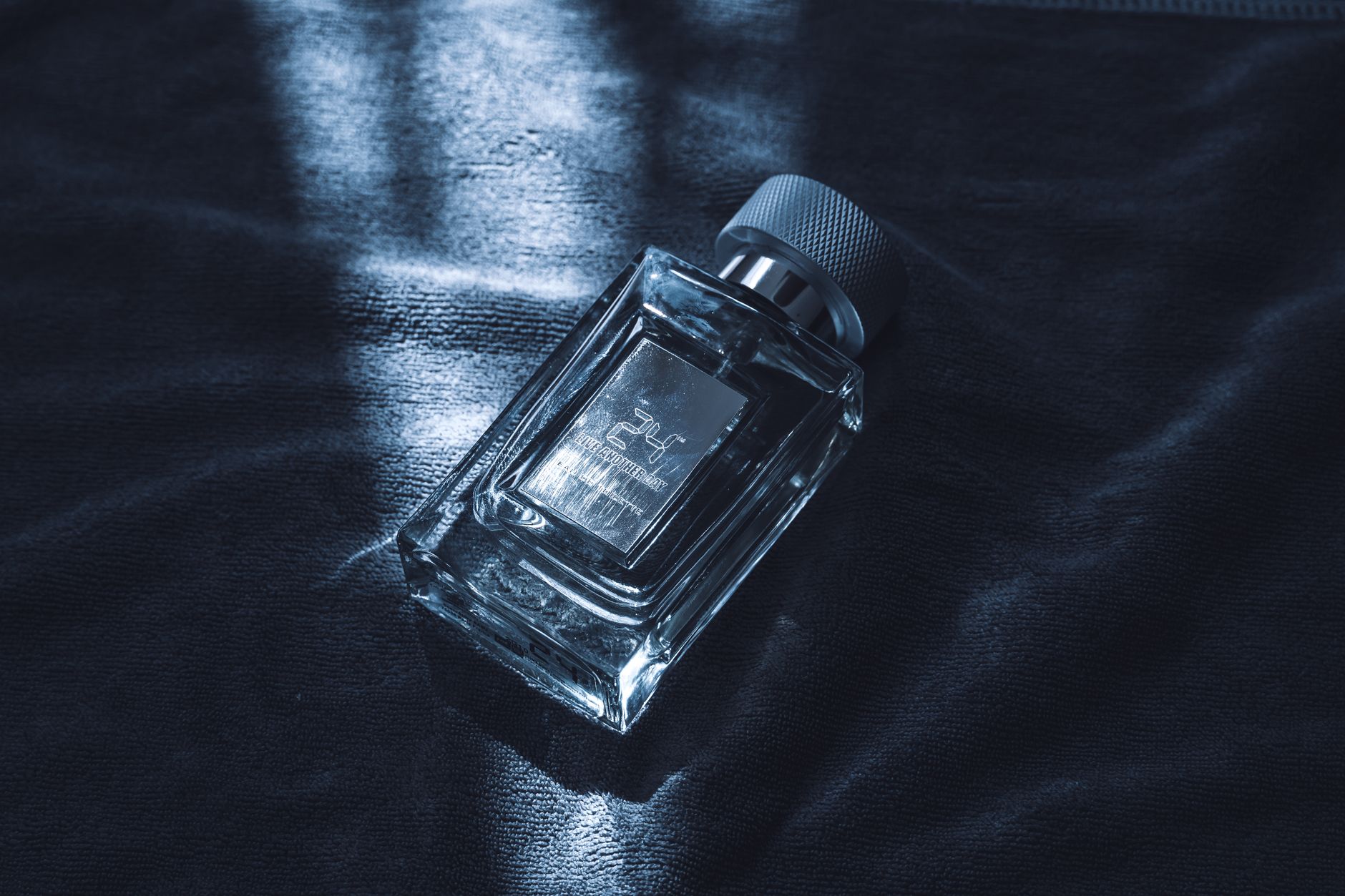 Luxury perfume bottles on a dark background, premium olfaction, fragrance world