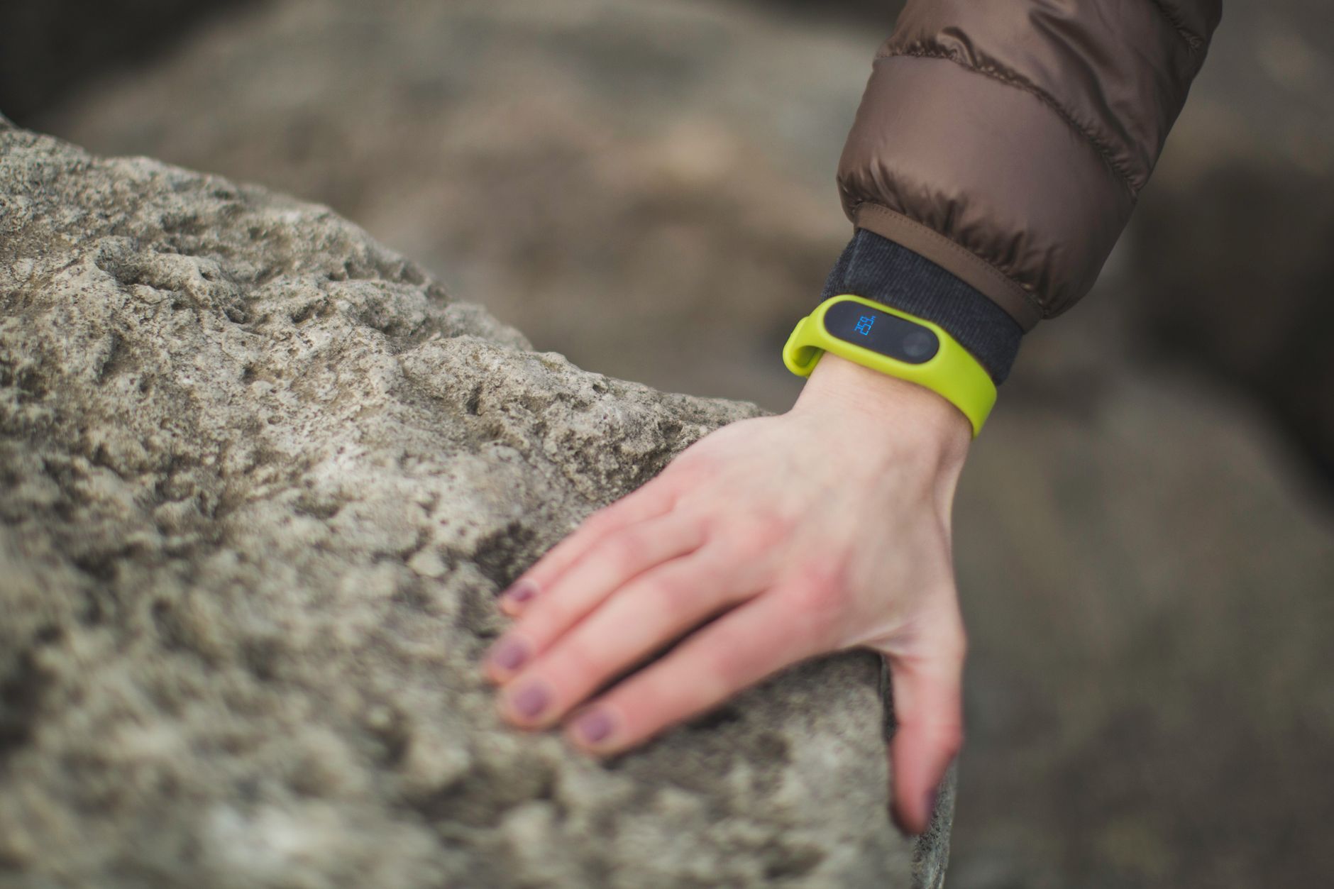 Smartwatch screen showing heart rate data and health metrics