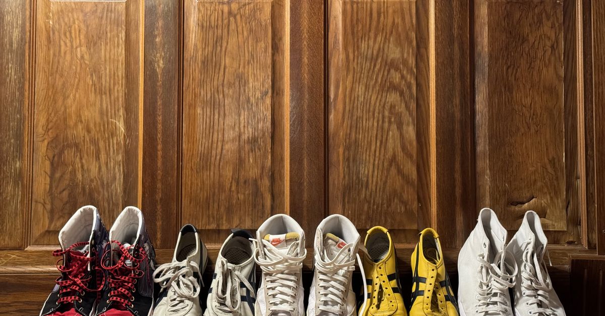 Collection of iconic sneaker silhouettes arranged on a display shelf